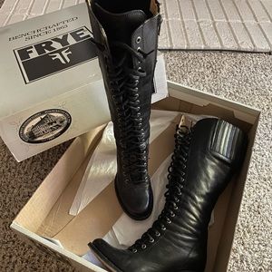 Black leather lace-up boots
